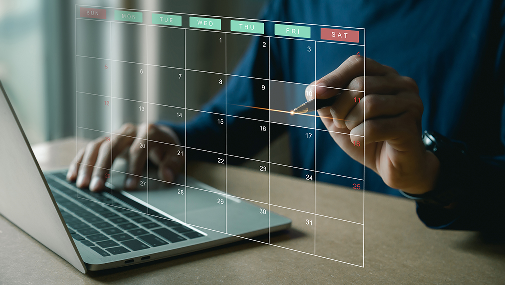 Person using laptop to schedule an appointment.
